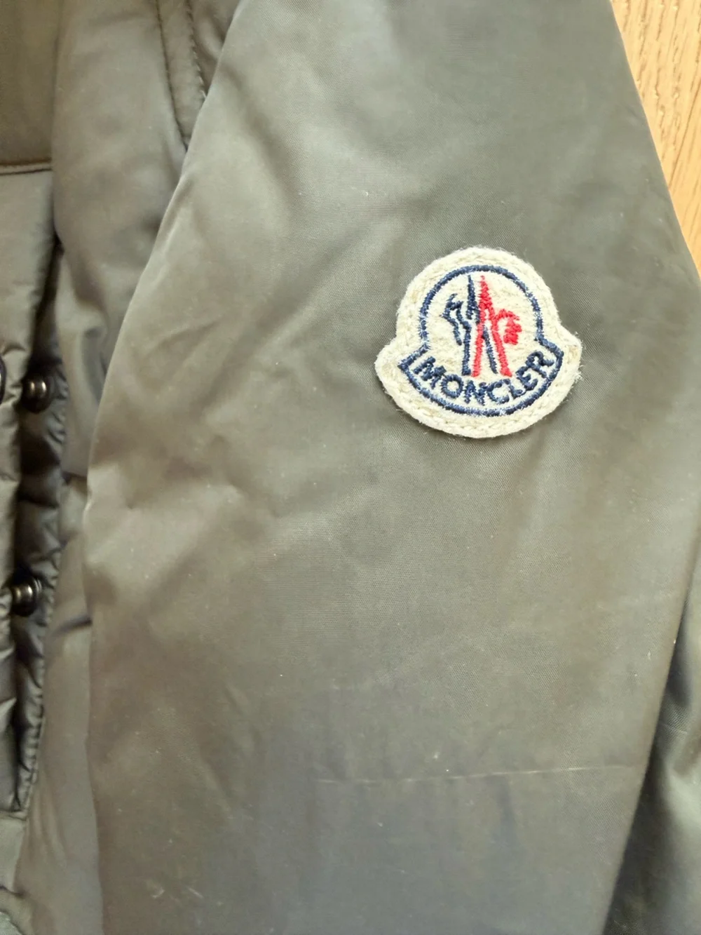 Moncler Boys Down Jacket in a beautiful olive green, size 5